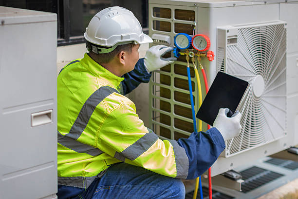 Professional Heat Pump Repair technician working in Larchmont, NY